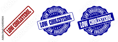 LOW CHOLESTEROL scratched stamp seals in red and blue colors. Vector LOW CHOLESTEROL labels with grainy style. Graphic elements are rounded rectangles, rosettes, circles and text tags.