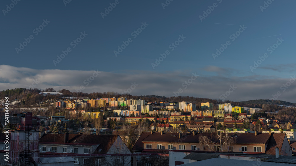 Vimperk town and block of flats in cold winter evening in sunset time