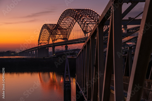 Sunset on the Mississippi River at Memphis bridge photo