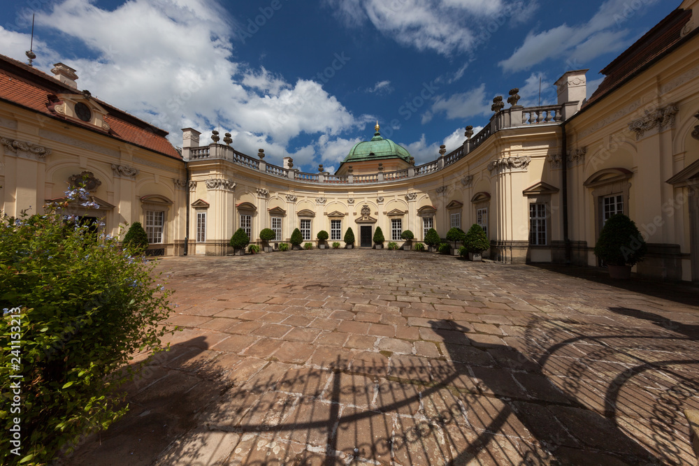 Half-round castle courtyard in a sunny day