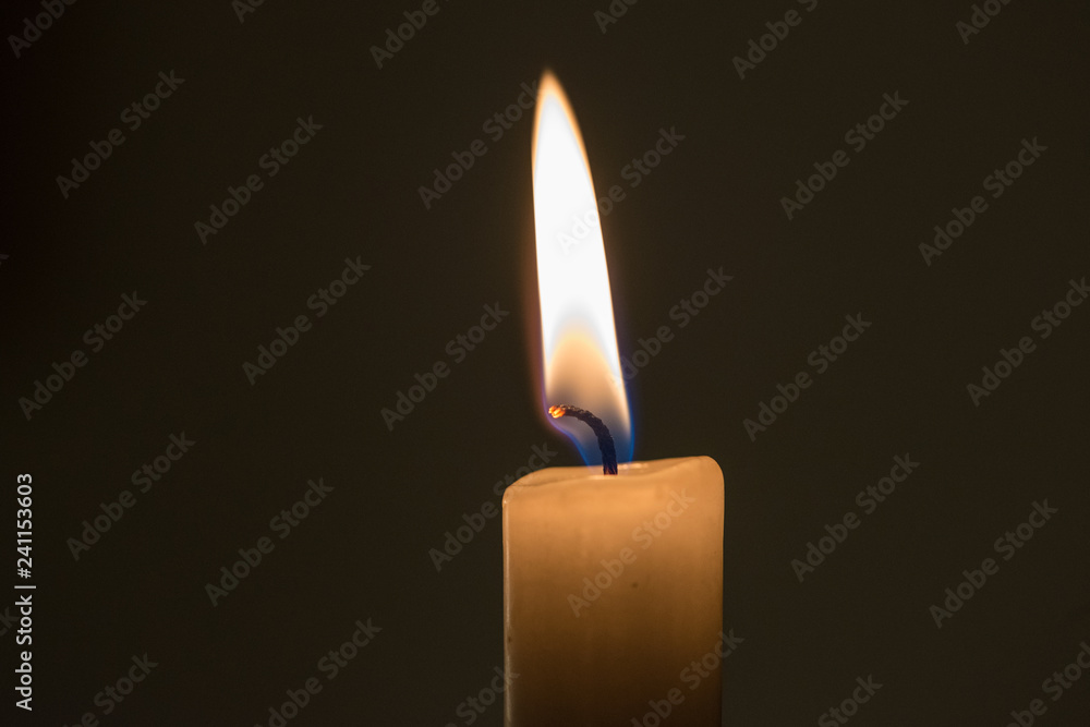 Soft and peaceful candle light closeup Soft and peaceful candle light closeup