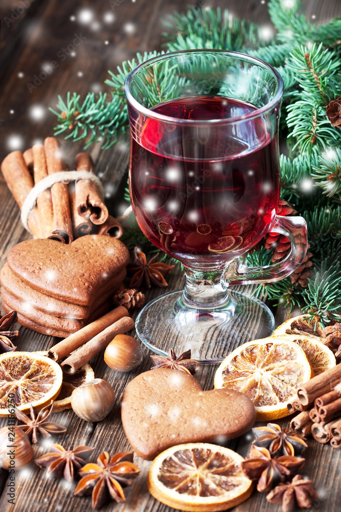 Glass with mulled wine and spices Glass with mulled wine and spices
