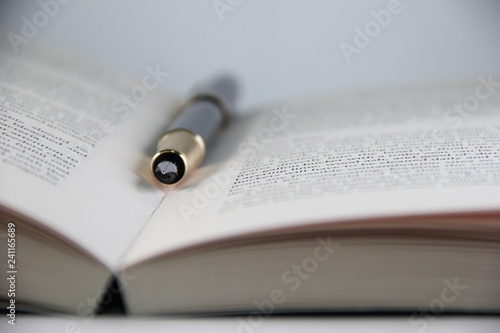 Parker pen on a book