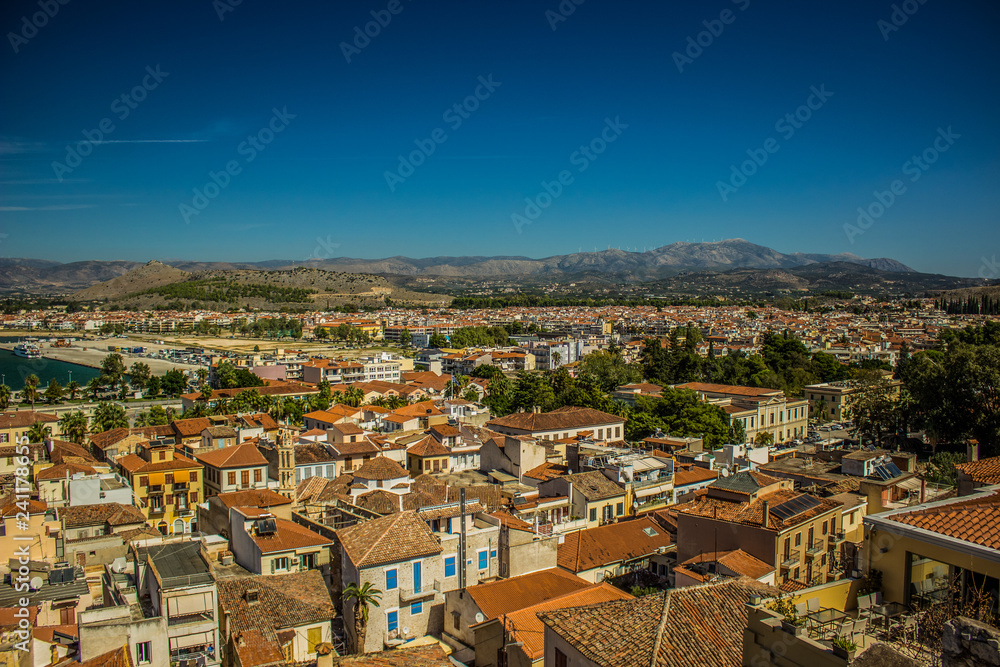 Obraz premium European medieval small city with shingles roofs aerial photography on mountain background scenic landscape