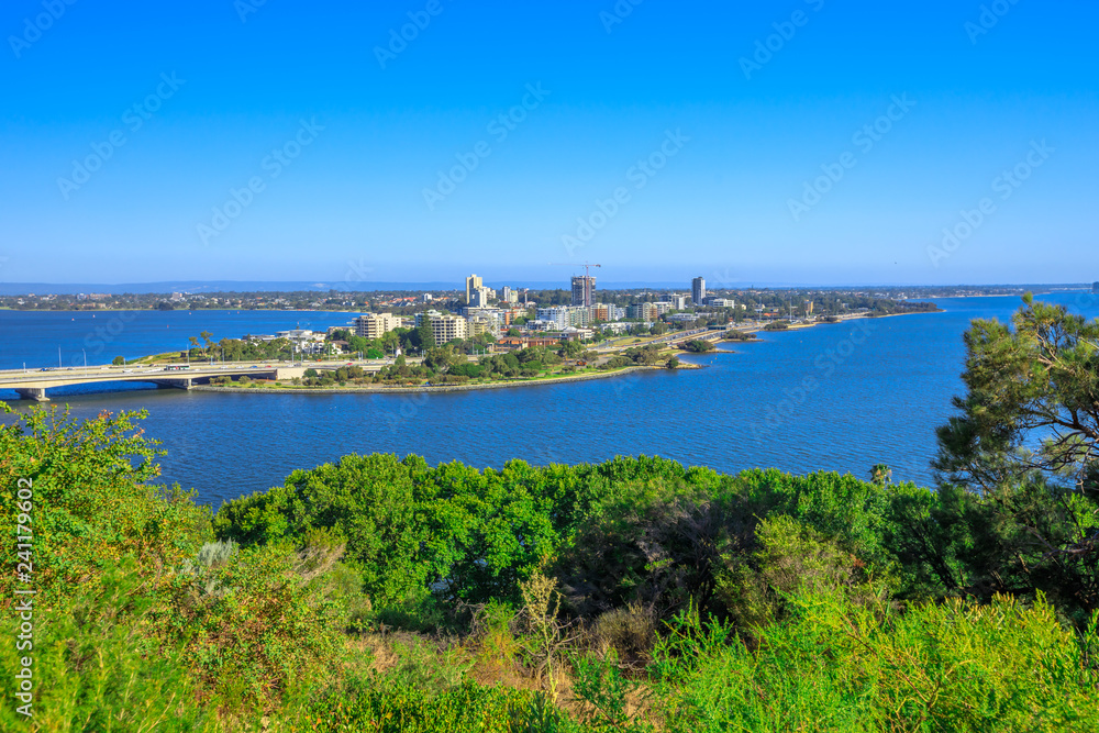 Mill Point on the Swan River see from Kings Park in Perth, Western Australia. Sunny day, blue sky with copy space. Perth skyline aerial view.