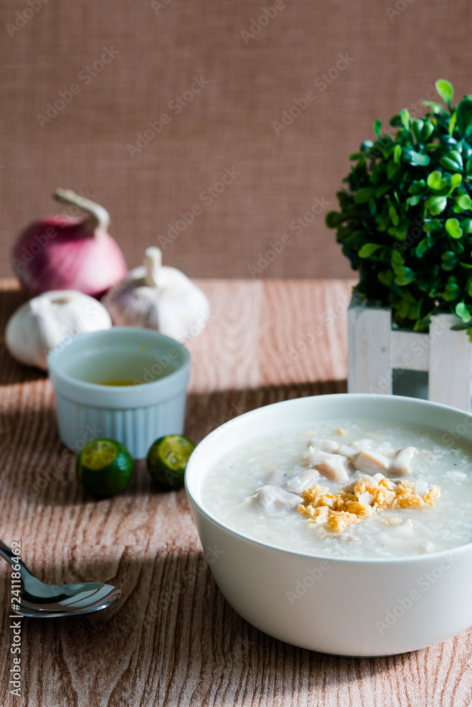 ox tripe congee or also known as goto best topped with fried garlic and calamansi juice