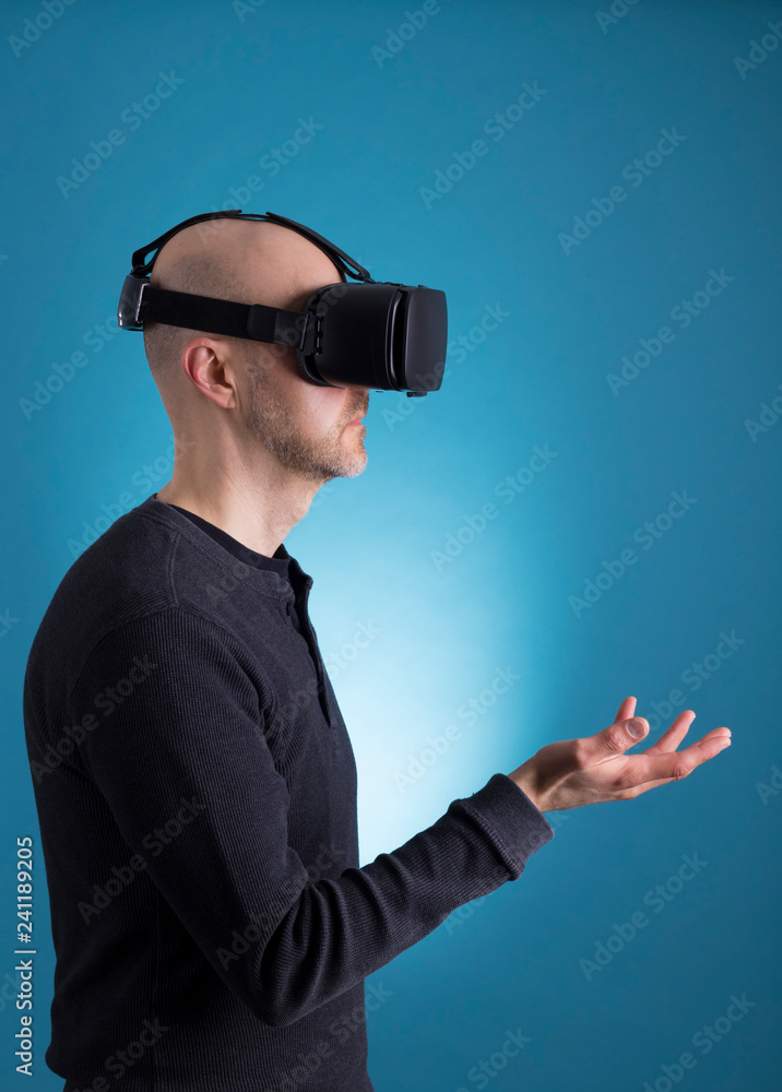 Man using VR Virtual Reality headset Man using VR Virtual Reality headset