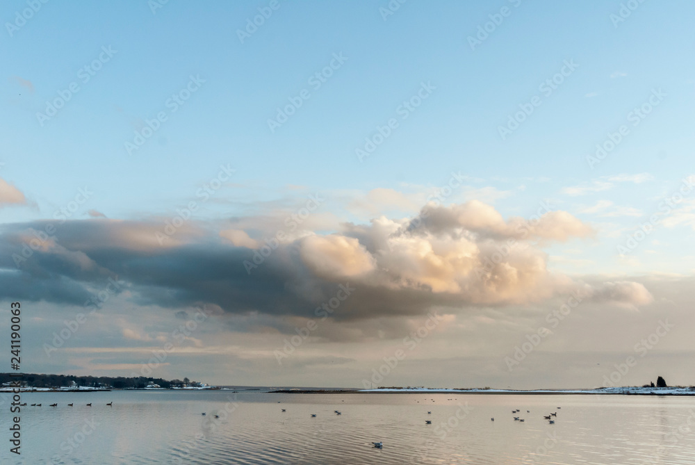 Obraz premium Thick clouds drifting over Narragansett Bay