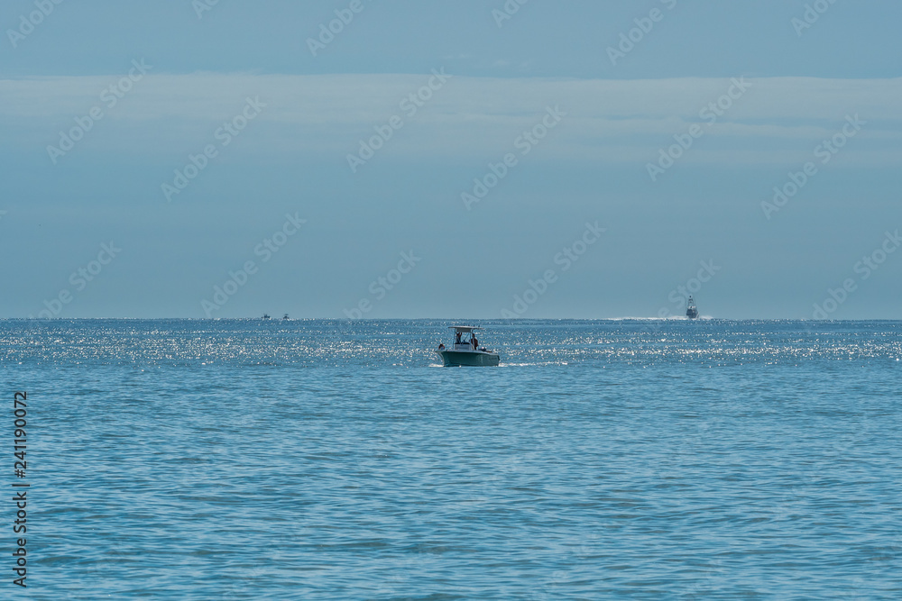 Coastal ocean waters with boats