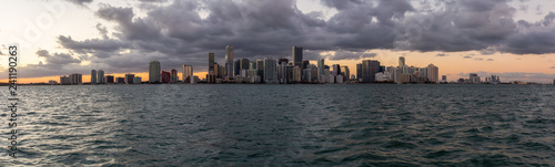 Beautiful panoramic view of a modern Downtown Cityscape during a dramatic and colorful sunset. Taken in Miami, Florida, United States of America.