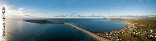Wallpaper Mural Aerial panoramic view of a small town on the Atlantic Ocean Coast during a vibrant sunny sunset. Taken in Cow Head, Newfoundland, Canada. Torontodigital.ca