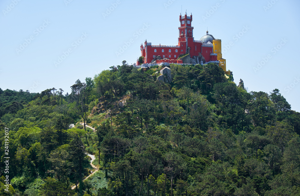 Pena Palace on the top of Sintra Mountains as seen from the Moorish castle. Sintra. Portugal
