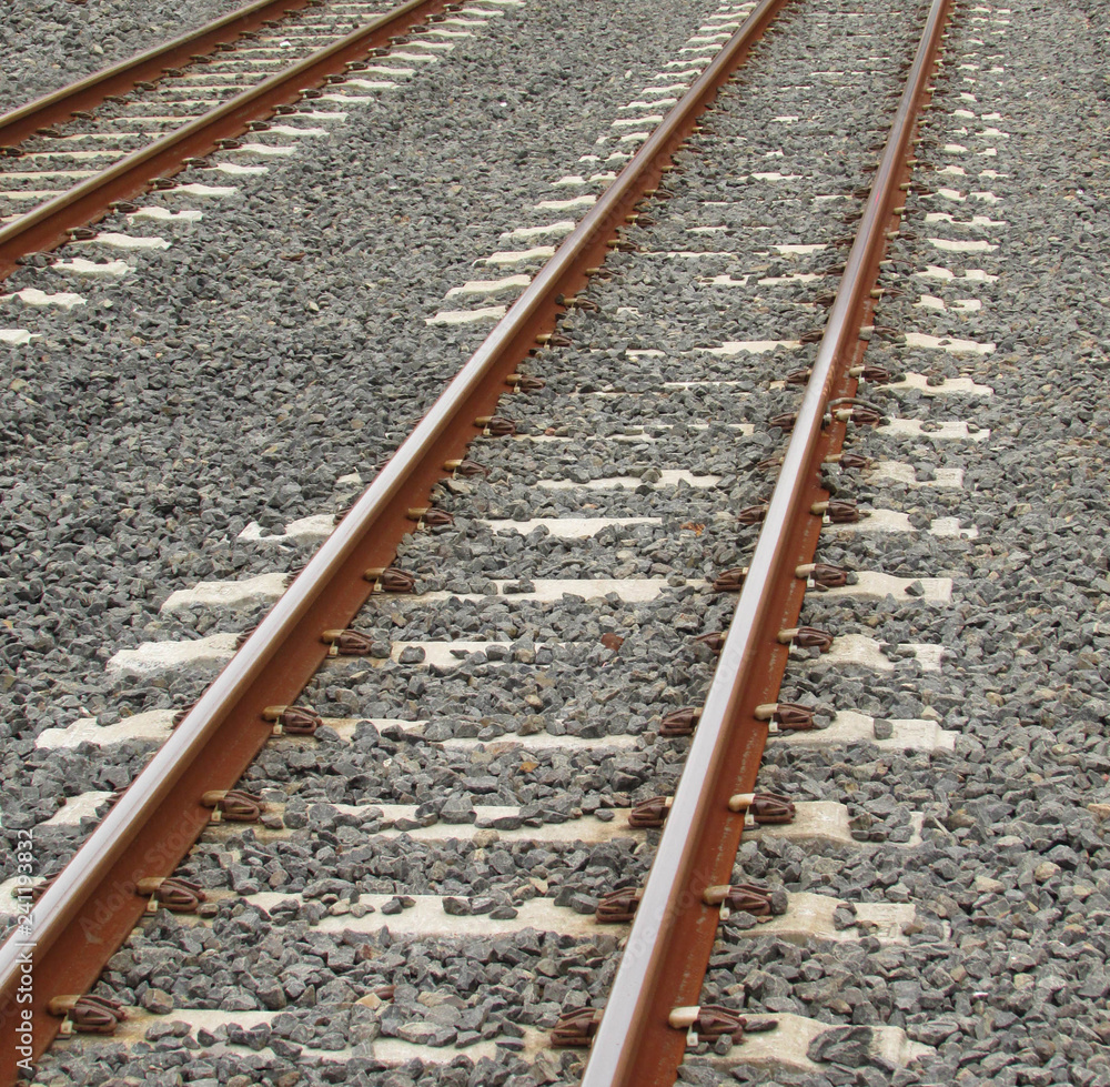 train tracks side by side railway lines medium closeup shot train tracks side by side railway lines medium closeup shot