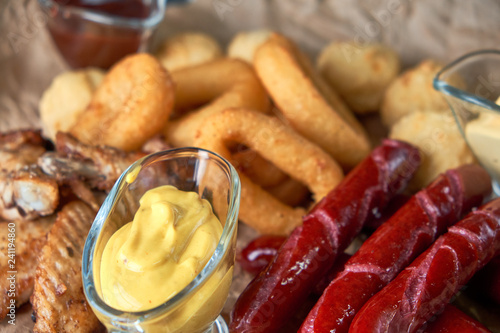 Grilled sausages with glass of beer pic