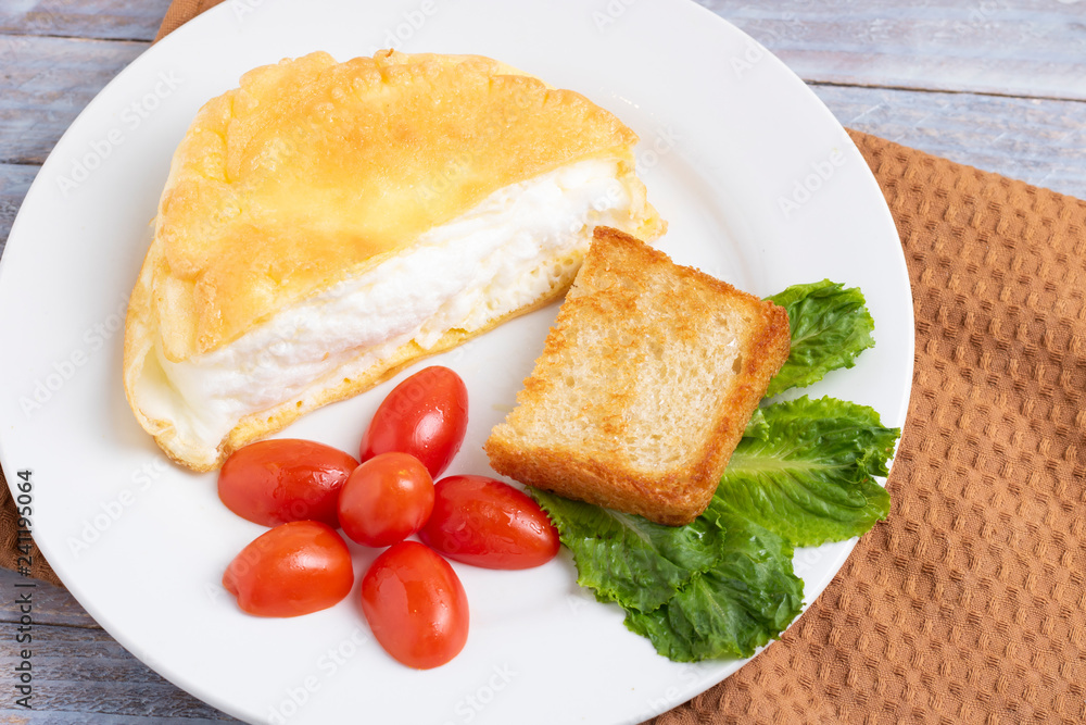 vegetable salad and omellete from beaten eggs vegetable salad and omellete from beaten eggs