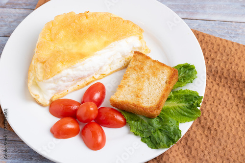 vegetable salad and omellete from beaten eggs