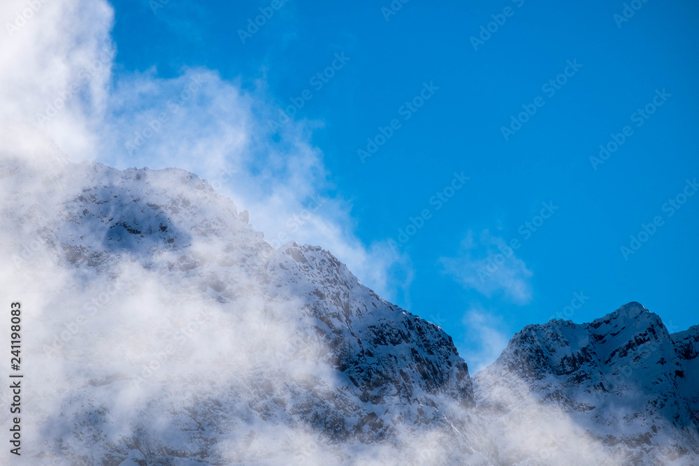 Some interesting clouds formation around a snow mountain in New Zealand.