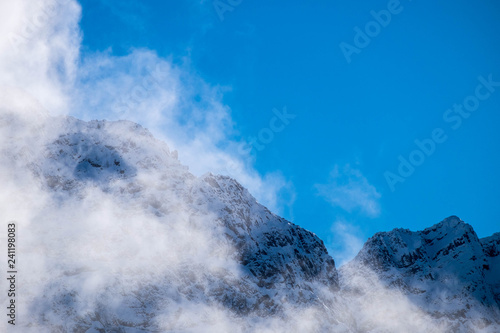 Some interesting clouds formation around a snow mountain in New Zealand.