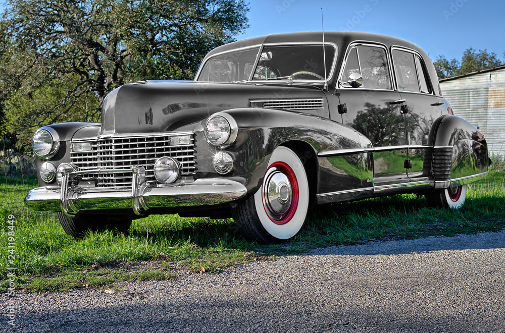 Classic car on rural country road Classic car on rural country road