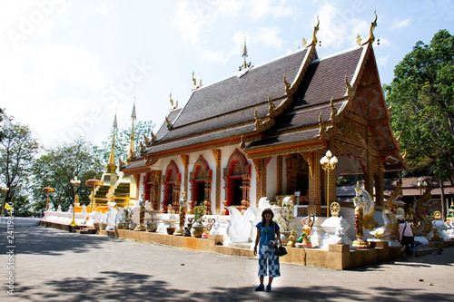 Thai people posing for take photo at Wat Phra That Doi Tung in Chiang Rai, Thailand