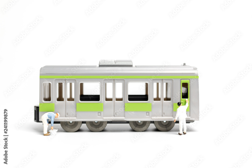Miniature people : Painters painting a Train on white background , Repairing concept Miniature people : Painters painting a Train on white background , Repairing concept