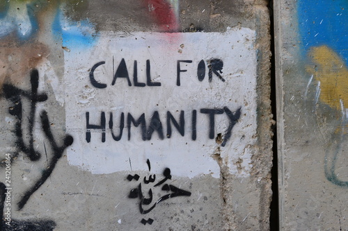 Call for humanity. Art and writings on the wall in Bethlehem, between Palestine Westbank and Israel