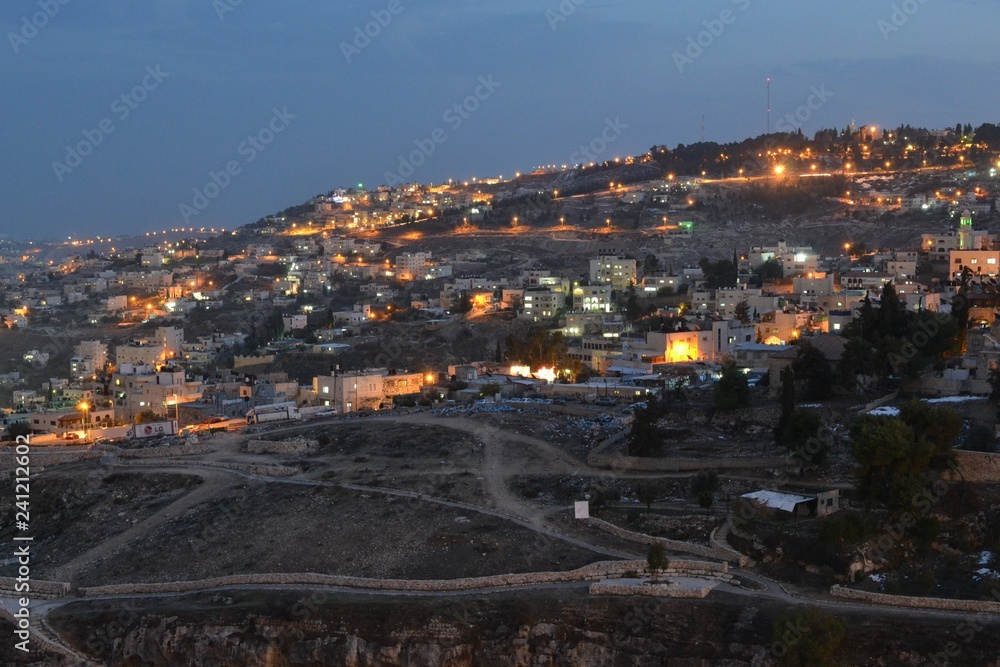 Jerusalem at dusk, night view of city hillside, Israel