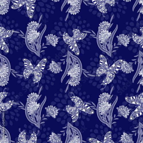  Seamless texture. Multicolor pattern of butterflies, flowers and leaves. Embroidery colorful simplified. monochrome blue tint