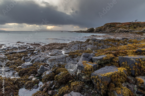 Beautiful Seascape and Sunset on the Beach on The Isle Of Skye © eyeforimages