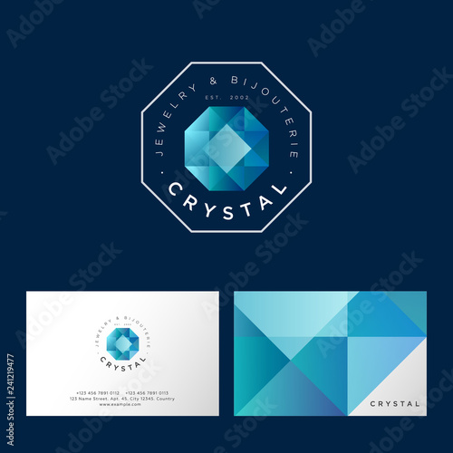 Crystal logo. Faceted gem blue crystal and letters. Business card.