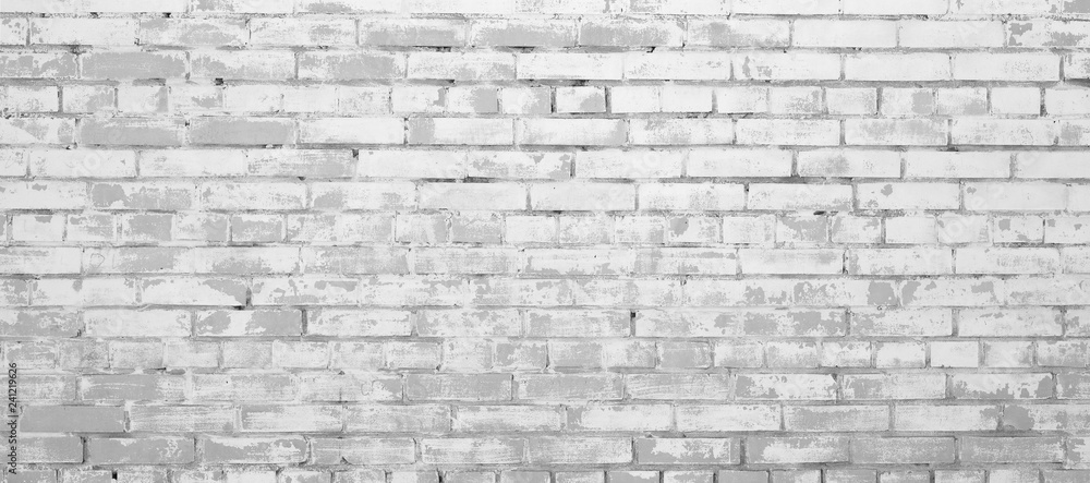 Obraz premium Brick wall painted with white paint.
