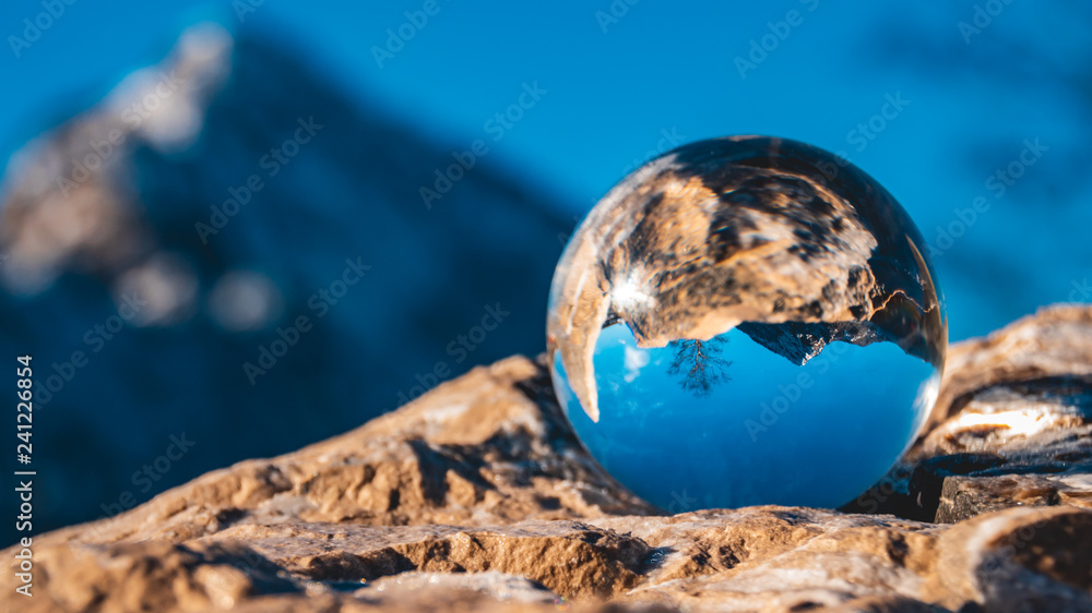 Crystal ball alpine winter landscape shot near Schoenau-Koenigssee-Bavaria-Germany Crystal ball alpine winter landscape shot near Schoenau-Koenigssee-Bavaria-Germany