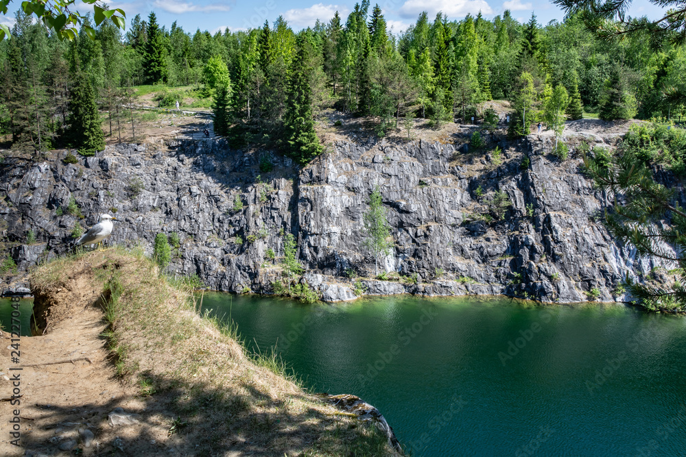 Artificial marble canyon filled with water Artificial marble canyon filled with water