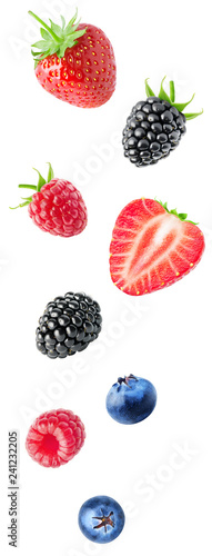 Isolated flying berries. Strawberry, blackberry, raspberry, blueberry fruits isolated on white background with clipping path