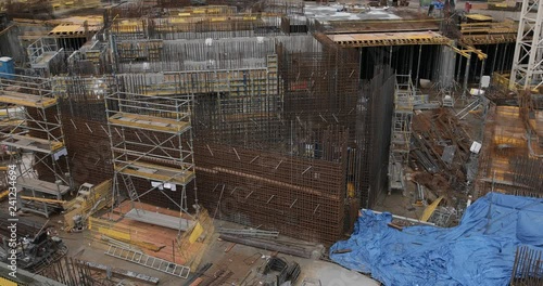 4K Footage of a uncomplete new building been built where the scaffolding and structure is still been layed. - Video