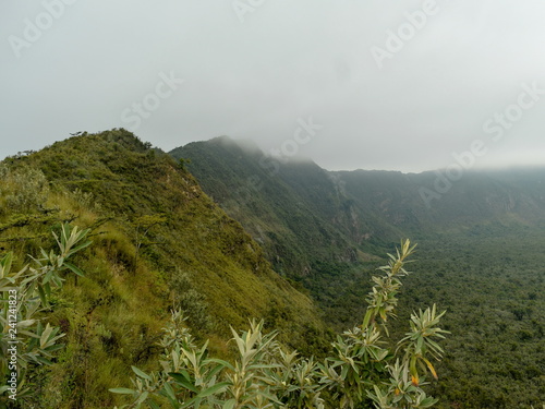 Hiking along the volcanic crater on Mount Longonot, Rift Valley, Kenya photo