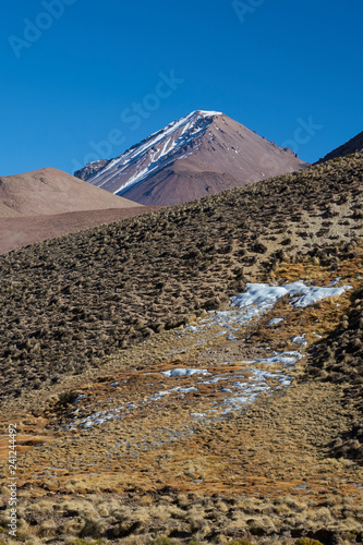 Cascade of frozen water on a hillside in Lauca National Park on the altiplano of northern Chile