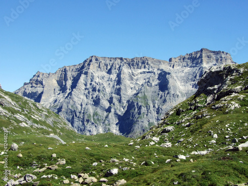 View to the Mittler Selbsanft Plattas Alvas peak in mountain mass Glarus Alps - Canton of Glarus, Switzerland photo