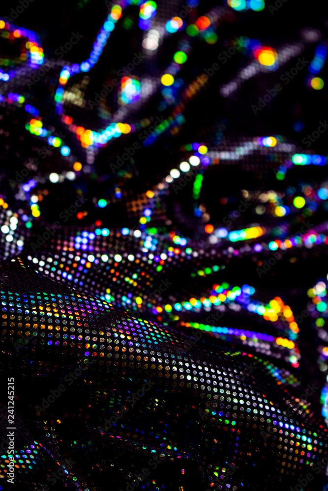 Obraz premium Holographic Sequin Rainbow Shiny Material Background