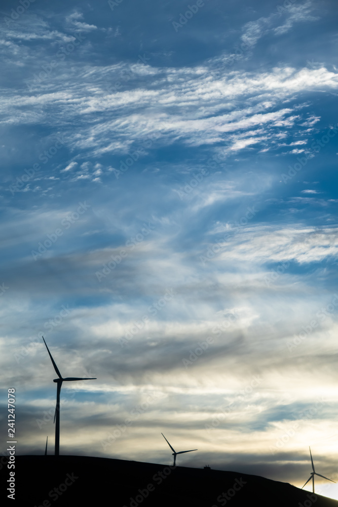 Fototapeta premium wind turbines on the hillside
