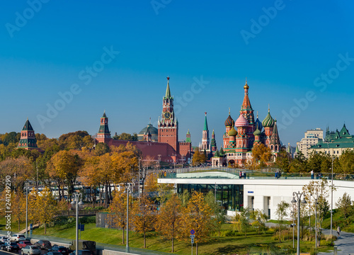 Spasskaya Tower of Kremlin and Cathedral of Vasily the Blessed (Saint Basil's Cathedral) and park "Zaryadye" in Moscow.