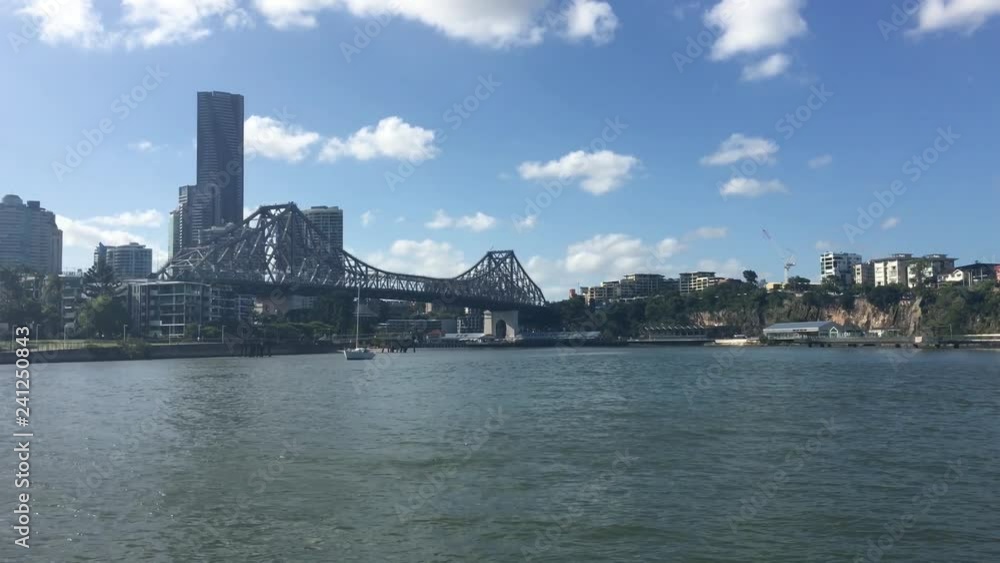 Ferry boats sail under The Story Bridge.It's the longest cantilever bridge in Australia, spanning the Brisbane River in Brisbane Queensland, Australia. Ferry boats sail under The Story Bridge.It's the longest cantilever bridge in Australia, spanning the Brisbane River in Brisbane Queensland, Australia.