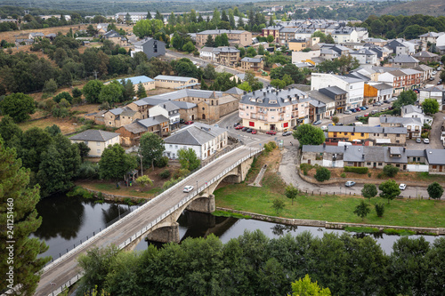 a view over Puebla de Sanabria town and the bridge over Tera river, province of Zamora, Spain 