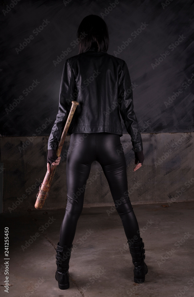 Sexy female assassin with a bat Sexy female assassin with a bat