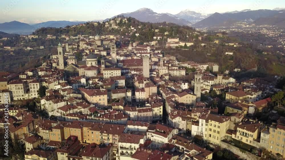 Bergamo, Italy. Drone aerial view of the old town. Landscape at the city center and its historical buildings during winter time Bergamo, Italy. Drone aerial view of the old town. Landscape at the city center and its historical buildings during winter time