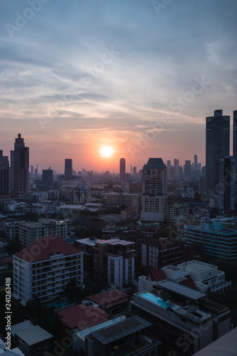 City View from High while Sun is Setting and Clouds around in Blue Sky at Bangkok, Thailand