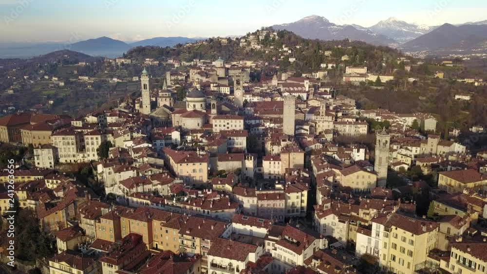Bergamo, Italy. Drone aerial view of the old town. Landscape at the city center and its historical buildings during winter time Bergamo, Italy. Drone aerial view of the old town. Landscape at the city center and its historical buildings during winter time