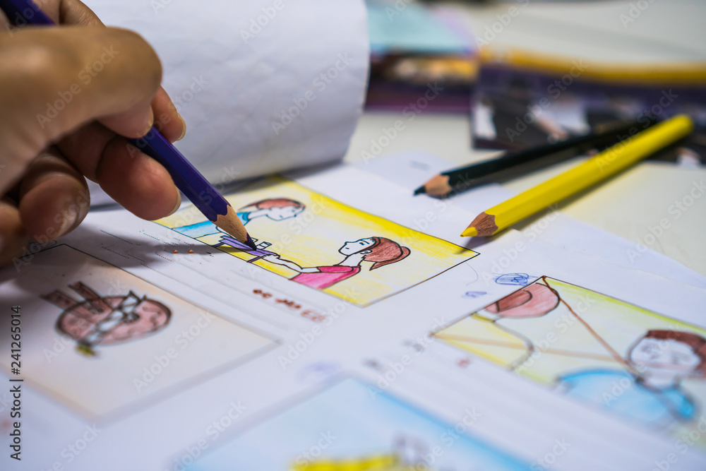 Designer drawing Story board movie video layout for pre-production,  development cartoon illustration animation for process media films in form  displayed script film production. Media product concept. Stock Photo |  Adobe Stock