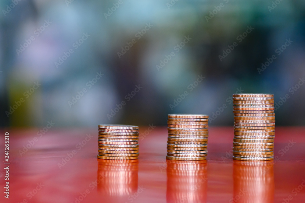step of coins stacks, money, saving and investment or family planning concept. step of coins stacks, money, saving and investment or family planning concept.