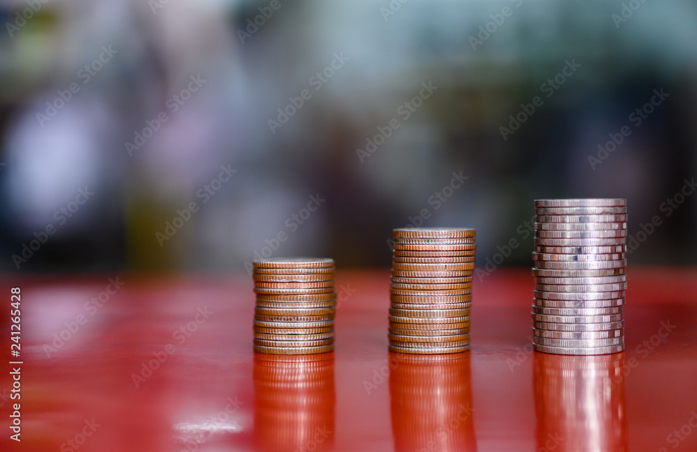 step of coins stacks, money, saving and investment or family planning concept. step of coins stacks, money, saving and investment or family planning concept.